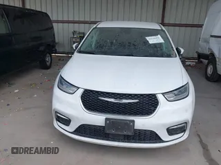 2023 Chrysler Pacifica Touring L with VIN 2C4RC1BG6PR550575, listed as a IAAI auction lot 42576498 with 54,373 mi miles and . Bid and sale history available at DreamBid. Image 12.
