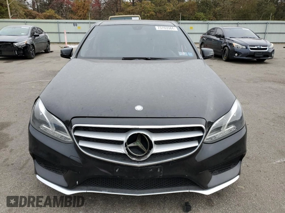 2014 Mercedes-Benz E 400 Sport with VIN WDDHF9FB4EA909283, listed as a Copart auction lot 73703584 with 73,857 mi miles and Salvage Title. Bid and sale history available at DreamBid. Image 5.