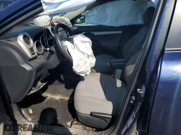 2011 Toyota Matrix with VIN 2T1KU4EE8BC687259, listed as a Copart auction lot 57562185 with 296,192 mi miles and Salvage title. Bid and sale history available at DreamBid. Image 7.