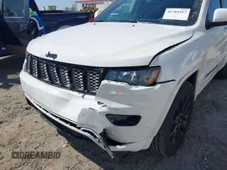 2021 Jeep Grand Cherokee Laredo X with VIN 1C4RJFAG7MC705966, listed as a IAAI auction lot 41784567 with 91,153 mi miles and . Bid and sale history available at DreamBid. Image 18.
