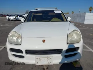 2005 Porsche Cayenne with VIN WP1AA29P85LA24175, listed as a IAAI auction lot 41301076 with 174,291 mi miles. Bid and sale history available at carsss.com. Image 12.