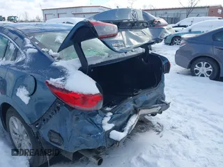 2016 Mazda 6 i Sport with VIN JM1GJ1U5XG1416911, listed as a IAAI auction lot 41562190 with 101,427 mi miles and . Bid and sale history available at DreamBid. Image 6.
