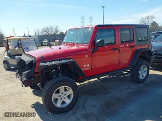 2008 Jeep Wrangler Unlimited X with VIN 1J4GA39188L619460, listed as a IAAI auction lot 41745778 with 199,799 mi miles. Bid and sale history available at carsss.com. Image 2.