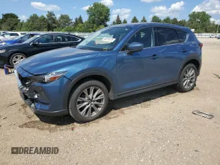 2020 Mazda CX-5 Grand Touring with VIN JM3KFBDM8L0854505, listed as a Copart auction lot 63079315 with 32,925 mi miles and Salvage title. Bid and sale history available at DreamBid. Image 1.