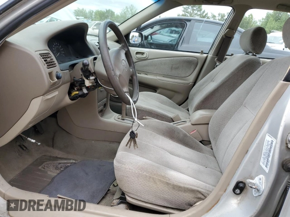 1999 Toyota Corolla VE with VIN 1NXBR12E3XZ153645, listed as a Copart auction lot 61005465 with Not provided miles and Clean title. Bid and sale history available at DreamBid. Image 7.