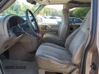 2003 Chevrolet Astro with VIN 1GNEL19X23B119896, listed as a Copart auction lot 68987584 with Not Provided miles and Salvage Title. Bid and sale history available at carsss.com. Image 7.
