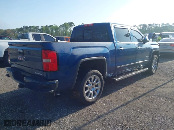 2015 GMC Sierra 1500 Denali z VIN 3GTP1WEC2FG201307, wystawiony jako IAAI lot #41931366 z przebiegiem 99 644 mil mil oraz . Historia ofert i sprzedaży dostępna na DreamBid. Obrazek 4.