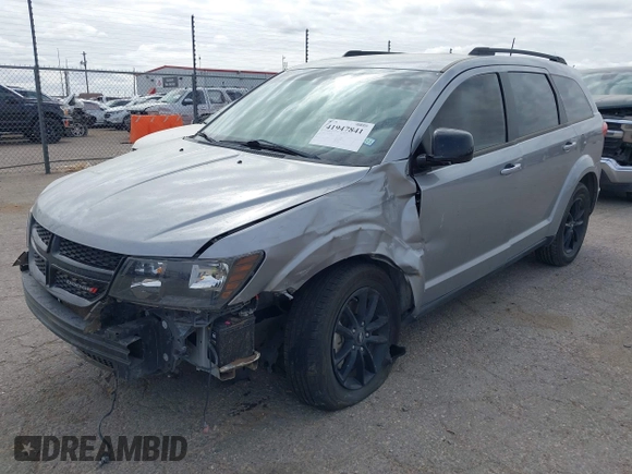 2019 Dodge Journey SE z VIN 3C4PDCBB5KT861358, wystawiony jako IAAI lot #41947841 z przebiegiem 82 099 mil mil oraz . Historia ofert i sprzedaży dostępna na DreamBid. Obrazek 2.
