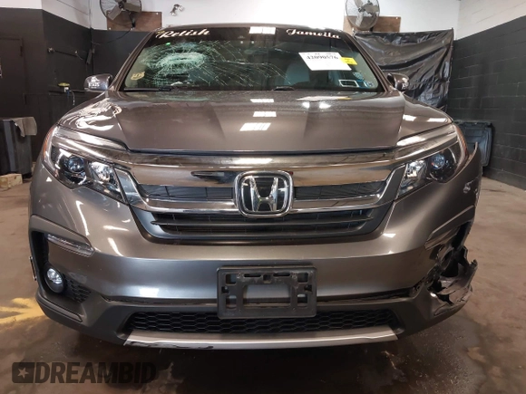 2022 Honda Pilot EX-L with VIN 5FNYF6H59NB000754, listed as a IAAI auction lot 42090576 with 32,813 mi miles and . Bid and sale history available at DreamBid. Image 12.