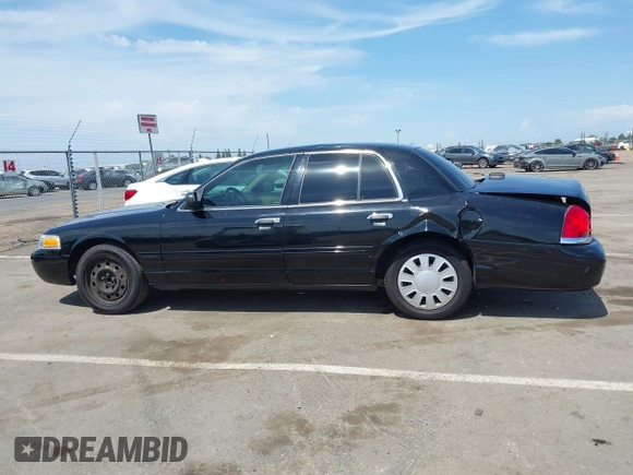 2008 Ford Police Interceptor z VIN 2FAFP71V98X160096, wystawiony jako IAAI lot #42041147 z przebiegiem 223 577 mil mil oraz . Historia ofert i sprzedaży dostępna na DreamBid. Obrazek 14.
