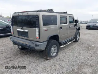 2004 Hummer H2 z VIN 5GRGN23U94H100078, wystawiony jako IAAI lot #42028741 z przebiegiem 106 795 mil mil oraz . Historia ofert i sprzedaży dostępna na DreamBid. Obrazek 4.