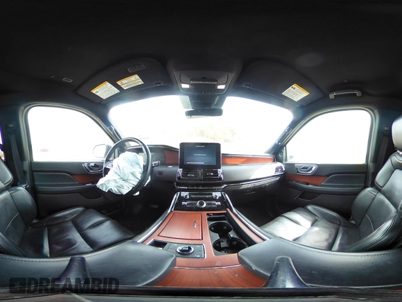 2020 Lincoln Navigator with VIN 5LMJJ2NTXLEL09782, listed as a IAAI auction lot 41639938 with 59,125 mi miles and . Bid and sale history available at DreamBid. Image 19.