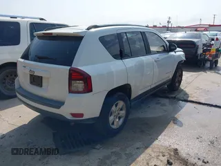 2014 Jeep Compass Altitude with VIN 1C4NJCBA0ED545173, listed as a IAAI auction lot 41924640 with 189,251 mi miles. Bid and sale history available at carsss.com. Image 4.