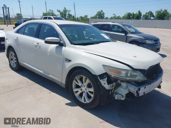 2011 Ford Taurus SEL z VIN 1FAHP2HW7BG148004, wystawiony jako IAAI lot #42245047 z przebiegiem 102 999 mil mil oraz . Historia ofert i sprzedaży dostępna na DreamBid. Obrazek 1.