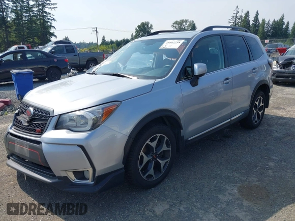 2015 Subaru Forester XT Touring with VIN JF2SJGWC1FH571301, listed as a IAAI auction lot 41682258 with 51,505 mi miles and . Bid and sale history available at DreamBid. Image 2.