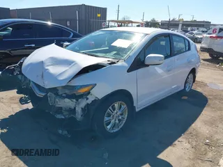 2010 Honda Insight EX with VIN JHMZE2H79AS039292, listed as a IAAI auction lot 41880303 with Not Provided miles and . Bid and sale history available at DreamBid. Image 17.