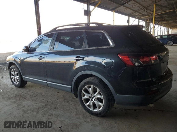 2015 Mazda CX-9 Touring с VIN JM3TB2CV1F0457586, выставлен на аукционе Copart как лот 63646475 с пробегом 125 509 миль миль и Чистый • Clean title. История ставок и продаж доступна на DreamBid. Изображение 2.