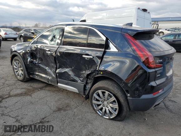 2021 Cadillac XT4 AWD Premium Luxury with VIN 1GYFZDR4XMF016846, listed as a Copart auction lot 82963704 with 44,063 mi miles and Salvage Title. Bid and sale history available at carsss.com. Image 2.