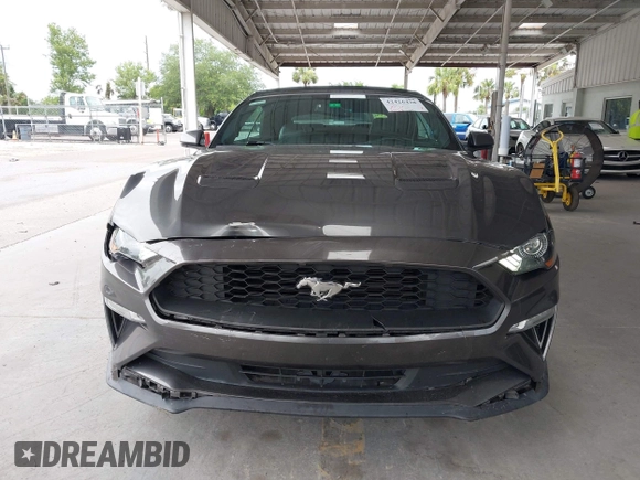 2018 Ford Mustang EcoBoost Premium with VIN 1FATP8UH8J5111817, listed as a IAAI auction lot 42426428 with 63,358 mi miles and . Bid and sale history available at DreamBid. Image 12.