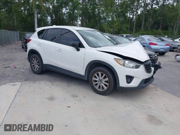 2015 Mazda CX-5 Touring with VIN JM3KE2CY8F0545967, listed as a IAAI auction lot 41909920 with 101,781 mi miles. Bid and sale history available at carsss.com. Image 1.