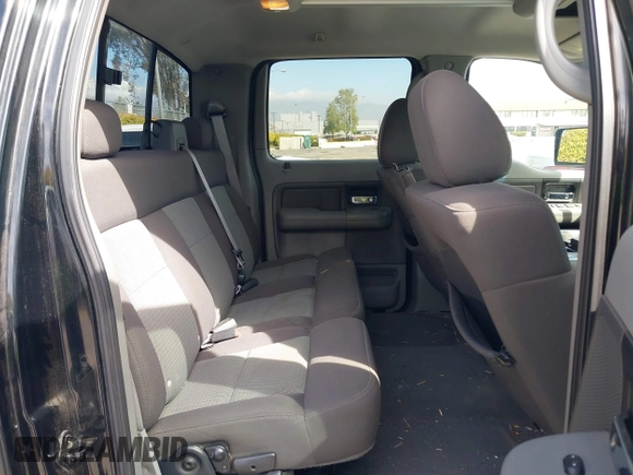 2004 Ford F-150 XLT with VIN 1FTPW14554KD15508, listed as a IAAI auction lot 41809154 with 184,790 mi miles. Bid and sale history available at carsss.com. Image 8.