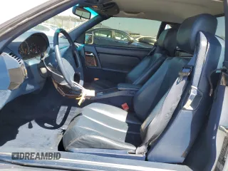 1992 Mercedes-Benz 500 z VIN WDBFA66E7NF049079, wystawiony jako Copart lot #52642285 z przebiegiem 69 976 mil mil oraz Szkody całkowita. Historia ofert i sprzedaży dostępna na DreamBid. Obrazek 7.