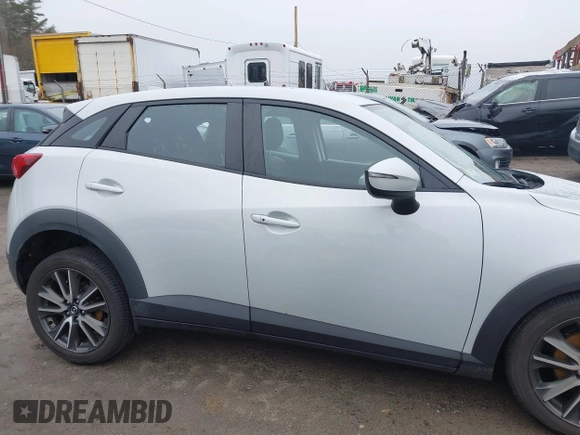 2017 Mazda CX-3 Touring with VIN JM1DKFC77H0155101, listed as a IAAI auction lot 41722040 with 92,653 mi miles. Bid and sale history available at carsss.com. Image 14.