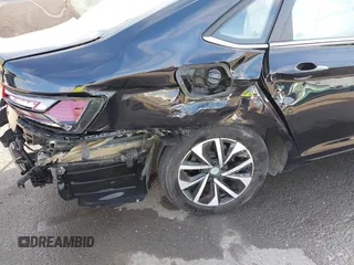 2024 Volkswagen Jetta S z VIN 3VW5M7BUXRM080630, wystawiony jako IAAI lot #42223967 z przebiegiem 35 103 mil mil oraz . Historia ofert i sprzedaży dostępna na DreamBid. Obrazek 6.