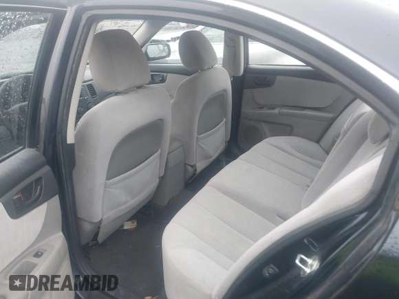 2009 Kia Optima LX z VIN KNAGE228095303047, wystawiony jako IAAI lot #41128475 z przebiegiem 165 317 mil mil oraz . Historia ofert i sprzedaży dostępna na DreamBid. Obrazek 8.