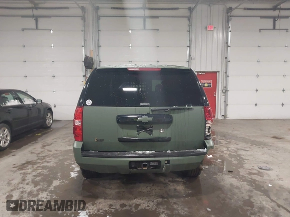 2014 Chevrolet Tahoe Commercial with VIN 1GNSK2E05ER196941, listed as a IAAI auction lot 41938892 with 176,170 mi miles and . Bid and sale history available at DreamBid. Image 17.