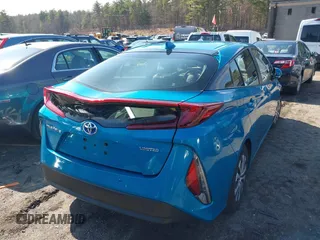 2021 Toyota Prius LE with VIN JTDKAMFP1M3166050, listed as a IAAI auction lot 41831145 with 54,350 mi miles and . Bid and sale history available at DreamBid. Image 4.