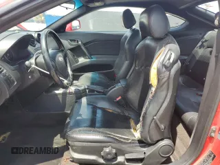 2003 Hyundai Tiburon GT z VIN KMHHN65F33U088538, wystawiony jako Copart lot #54320955 z przebiegiem 220 732 mil mil oraz Szkoda całkowita • Salvage title. Historia ofert i sprzedaży dostępna na DreamBid. Obrazek 7.