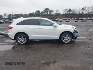 2015 Acura RDX Tech Pkg with VIN 5J8TB4H57FL021547, listed as a IAAI auction lot 41978867 with 104,719 mi miles. Bid and sale history available at carsss.com. Image 13.