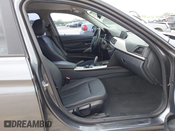 2013 BMW 3 Series 320i with VIN WBA3B1C53DK128602, listed as a IAAI auction lot 41952771 with 103,564 mi miles and . Bid and sale history available at carsss.com. Image 5.