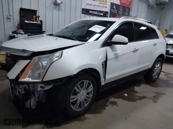 2014 Cadillac SRX Performance Collection with VIN 3GYFNFE36ES615440, listed as a IAAI auction lot 41830849 with 125,128 mi miles and . Bid and sale history available at DreamBid. Image 22.