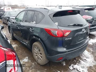 2014 Mazda CX-5 Touring with VIN JM3KE2CY2E0407453, listed as a IAAI auction lot 41564916 with 104,852 mi miles. Bid and sale history available at carsss.com. Image 3.