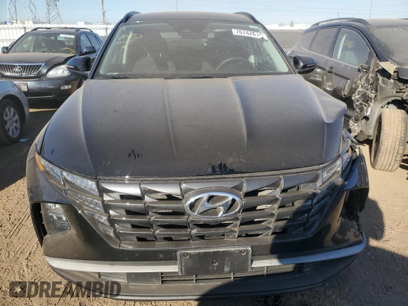 2022 Hyundai Tucson SEL with VIN 5NMJBCAE9NH137827, listed as a Copart auction lot 76742814 with 22,137 mi miles and Salvage Title. Bid and sale history available at carsss.com. Image 5.