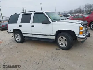 1997 Chevrolet Tahoe with VIN 1GNEK13R4VJ361515, listed as a IAAI auction lot 41768386 with 216,974 mi miles. Bid and sale history available at carsss.com. Image 1.