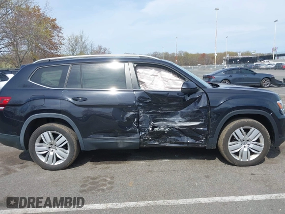 2019 Volkswagen Atlas SE with VIN 1V2UR2CA4KC616890, listed as a IAAI auction lot 42080701 with 48,269 mi miles and . Bid and sale history available at DreamBid. Image 13.