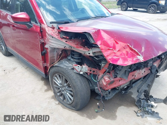 2019 Mazda CX-5 Touring with VIN JM3KFACM6K1549234, listed as a IAAI auction lot 42036633 with 85,065 mi miles and . Bid and sale history available at carsss.com. Image 18.