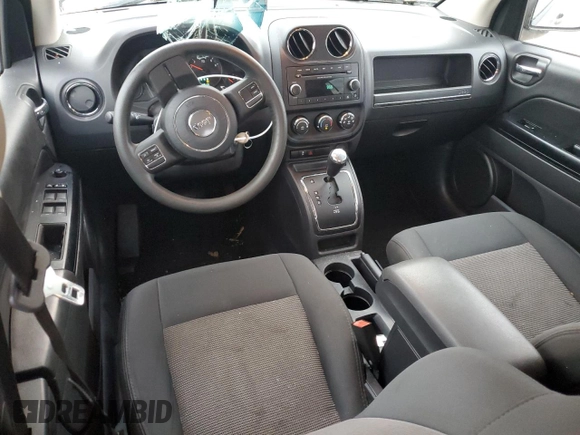 2012 Jeep Compass Sport with VIN 1C4NJDBB3CD522725, listed as a Copart auction lot 79387244 with 134,814 mi miles and Salvage Title. Bid and sale history available at carsss.com. Image 8.