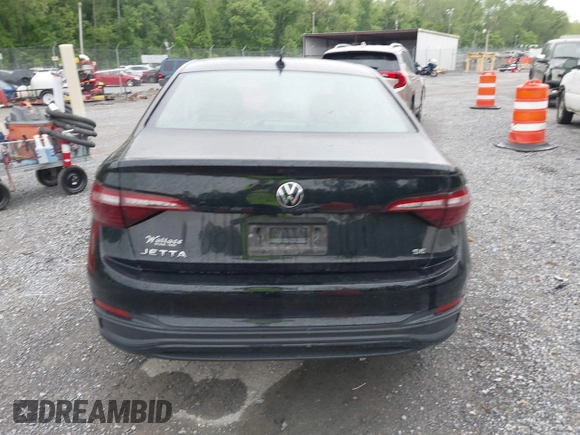 2023 Volkswagen Jetta SE z VIN 3VW7M7BUXPM061694, wystawiony jako IAAI lot #42231342 z przebiegiem 39 063 mil mil oraz . Historia ofert i sprzedaży dostępna na DreamBid. Obrazek 16.