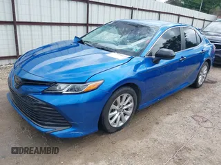 2019 Toyota Camry LE with VIN 4T1B11HK7KU259920, listed as a IAAI auction lot 42115493 with 69,254 mi miles and . Bid and sale history available at DreamBid. Image 2.