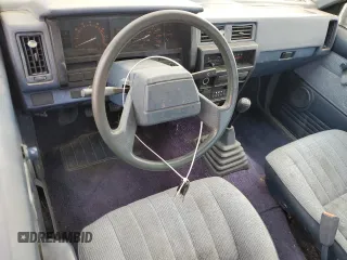 1988 Nissan Hardbody z VIN 1N6ND16S7JC395431, wystawiony jako Copart lot #86765244 z przebiegiem 99 134 mil mil oraz Tytuł czysty. Historia ofert i sprzedaży dostępna na DreamBid. Obrazek 8.