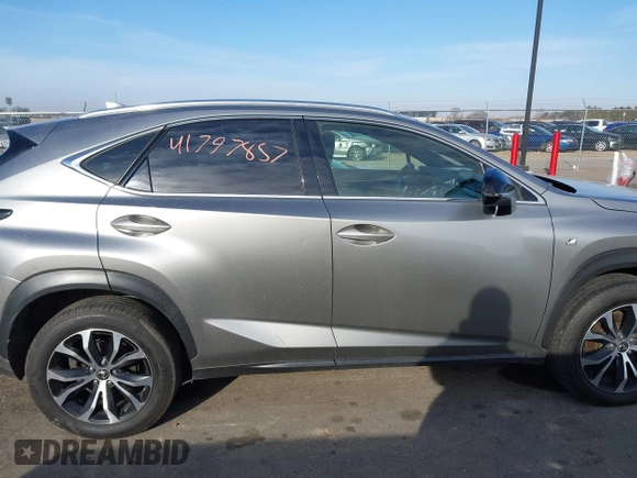 2015 Lexus NX 200t with VIN JTJBARBZ2F2002932, listed as a IAAI auction lot 41797857 with 205,902 mi miles and . Bid and sale history available at DreamBid. Image 13.