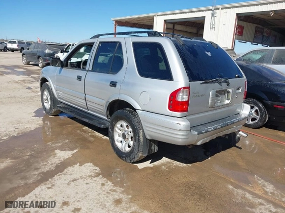 2002 Isuzu Rodeo S with VIN 4S2CK58WX24321556, listed as a IAAI auction lot 41405981 with 172,590 mi miles. Bid and sale history available at carsss.com. Image 3.