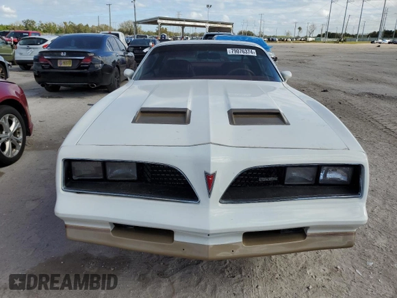 1978 Pontiac Firebird с VIN 2U87K8L123850, выставлен на аукционе Copart как лот 79076374 с пробегом 64 829 миль миль и Списание • Salvage title. История ставок и продаж доступна на DreamBid. Изображение 5.