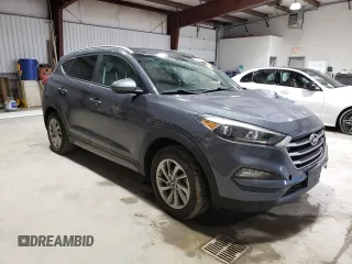 2018 Hyundai Tucson SEL with VIN KM8J3CA40JU600070, listed as a Copart auction lot 52966625 with 119,218 mi miles and Salvage title. Bid and sale history available at DreamBid. Image 4.