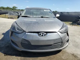 2012 Hyundai Veloster w/Black Int z VIN KMHTC6AD4CU046609, wystawiony jako Copart lot #54888045 z przebiegiem 152 997 mil mil oraz Szkoda całkowita • Salvage title. Historia ofert i sprzedaży dostępna na DreamBid. Obrazek 5.