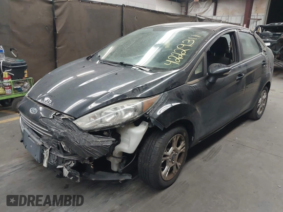 2015 Ford Fiesta SE with VIN 3FADP4BJ1FM133520, listed as a IAAI auction lot 42229311 with 174,734 mi miles and . Bid and sale history available at DreamBid. Image 2.